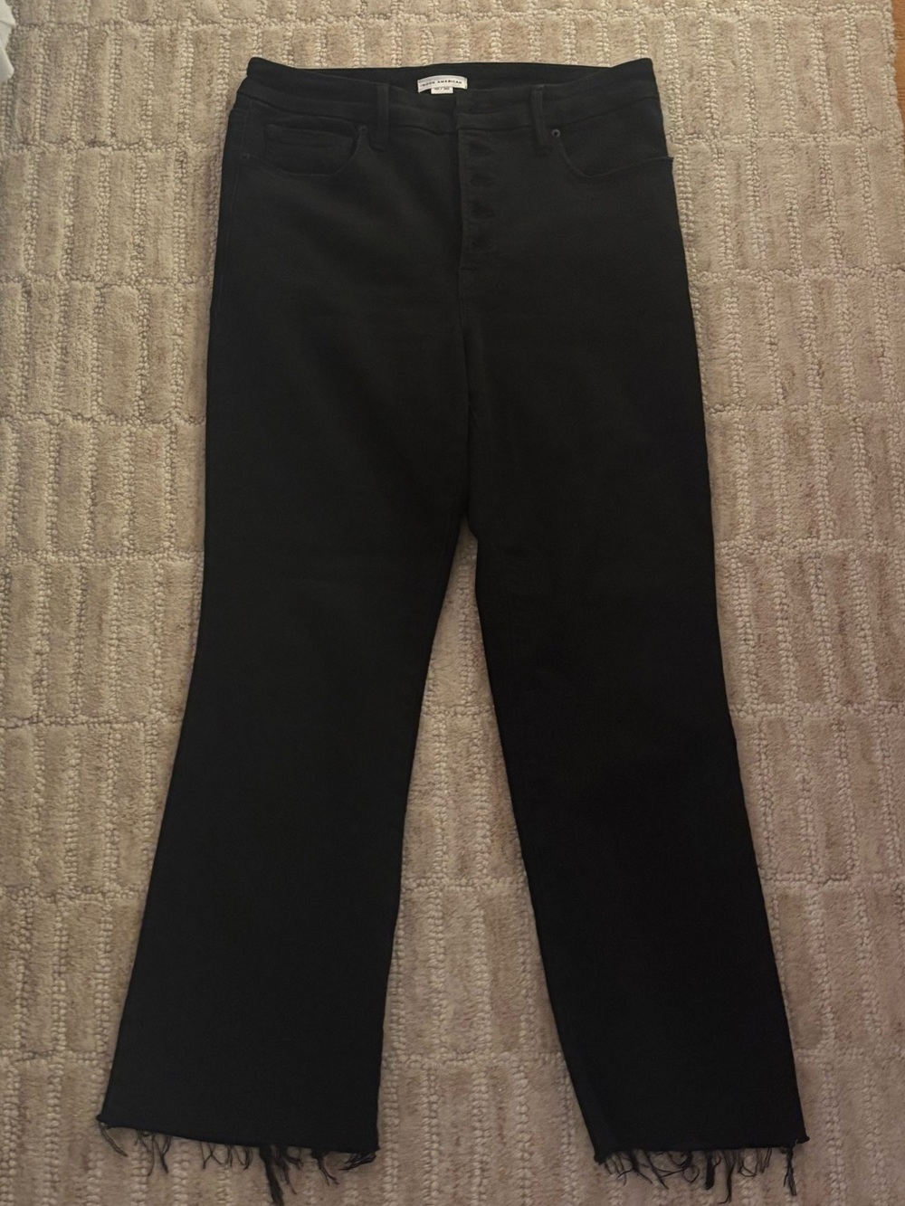 Good American Black Flare Jeans with Raw Hem
